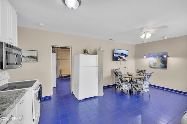 dining area featuring ceiling fan