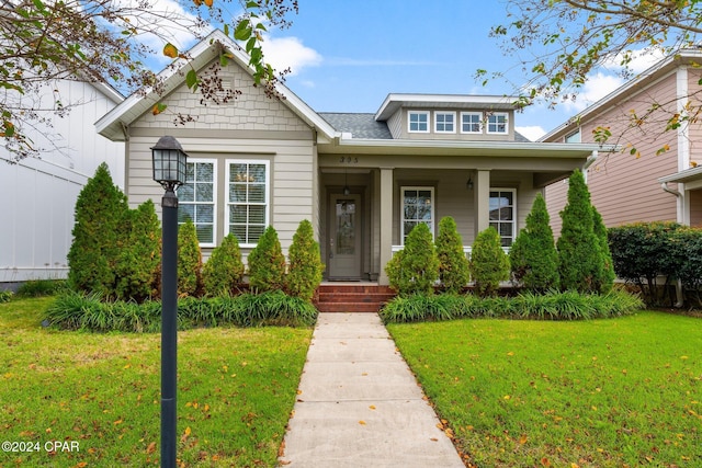 bungalow with a front yard