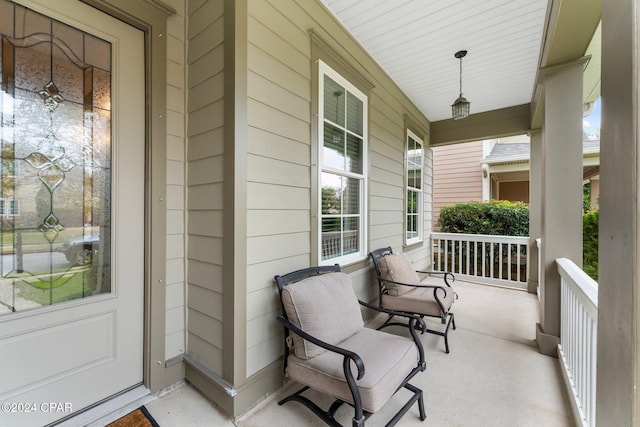 balcony featuring covered porch