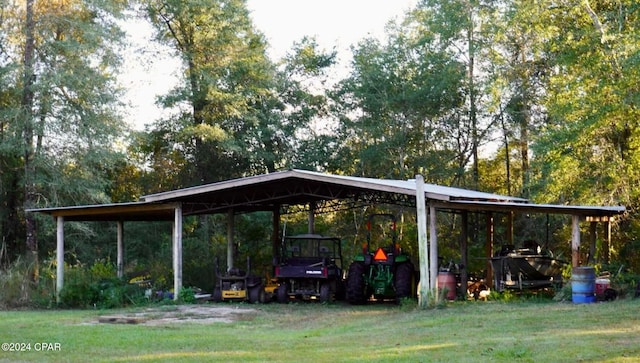 exterior space with a yard and a carport