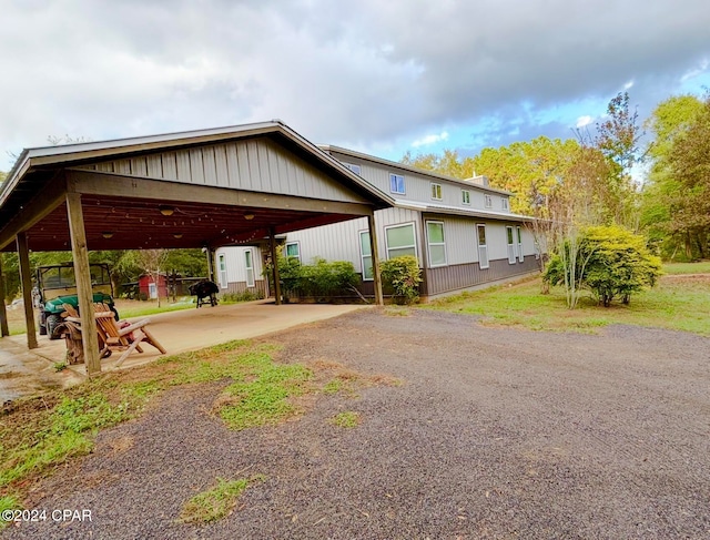 exterior space featuring a carport