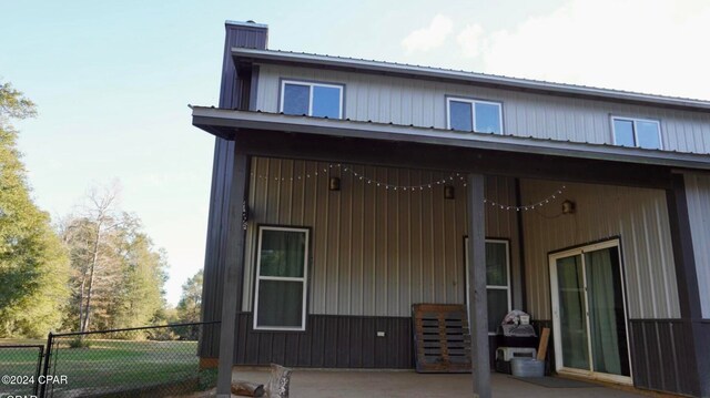 back of property featuring a patio area