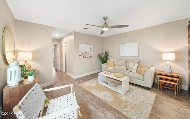 bedroom with access to outside, ceiling fan, french doors, and wood-type flooring