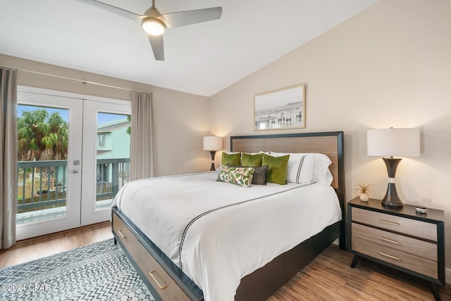 bedroom featuring lofted ceiling, light wood finished floors, access to outside, and ceiling fan