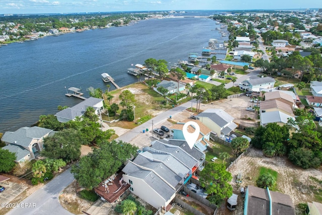 aerial view with a residential view and a water view