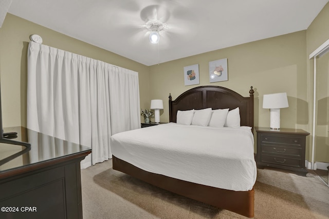 carpeted bedroom with ceiling fan