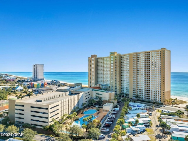 bird's eye view featuring a beach view and a water view