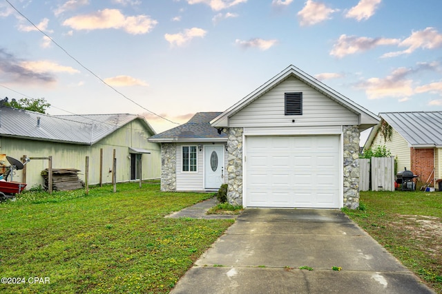 view of front of house with a yard