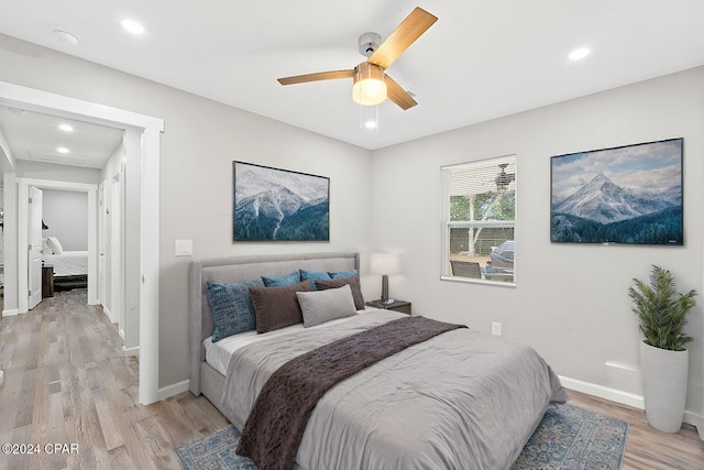 bedroom featuring ceiling fan and light wood-type flooring