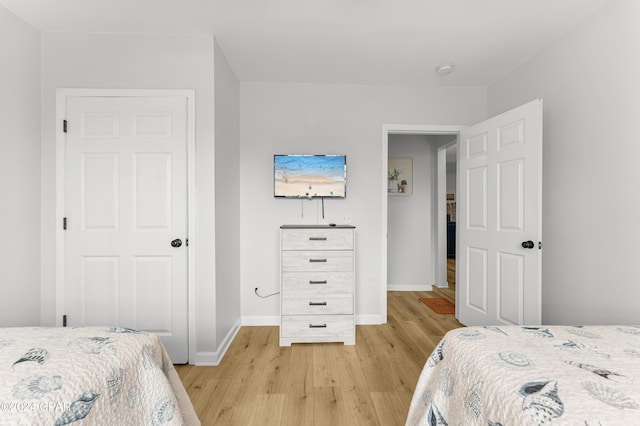 bedroom featuring light hardwood / wood-style flooring