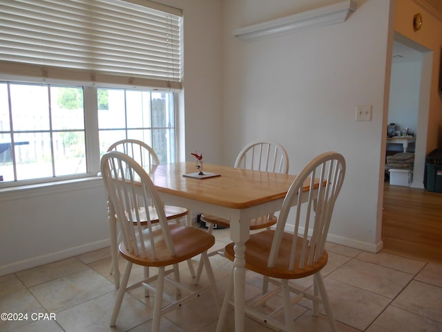 view of tiled dining space