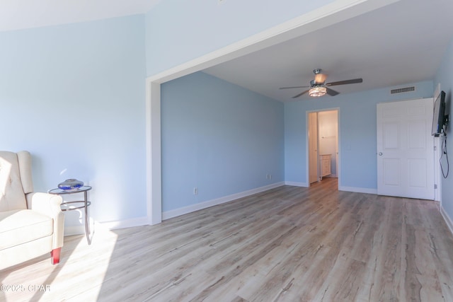 interior space with ceiling fan and light hardwood / wood-style flooring