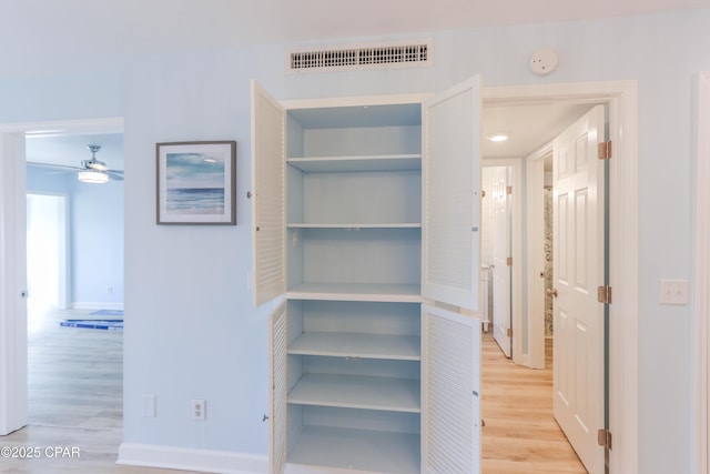 closet featuring visible vents