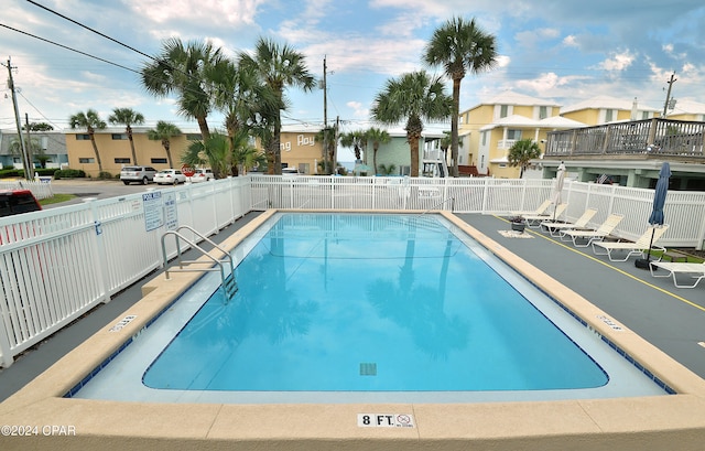 view of pool featuring a patio area