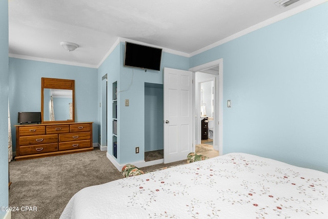 bedroom featuring carpet flooring and crown molding