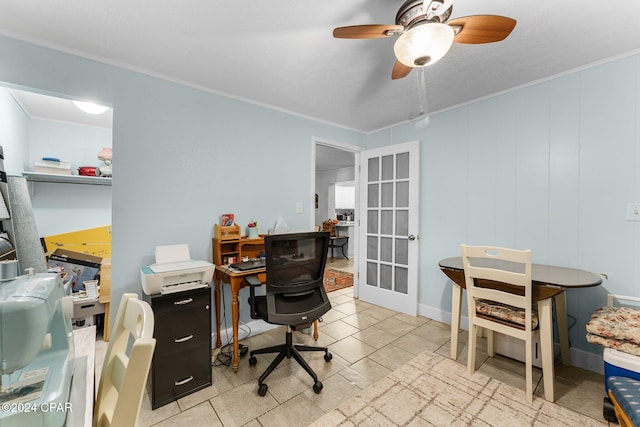 tiled office space featuring ceiling fan, french doors, and ornamental molding