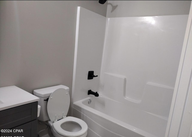 full bathroom with toilet, vanity, and bathing tub / shower combination