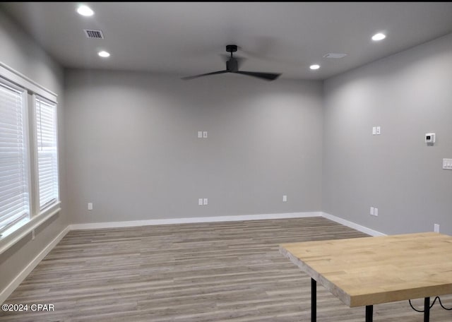 unfurnished room with light hardwood / wood-style floors and ceiling fan