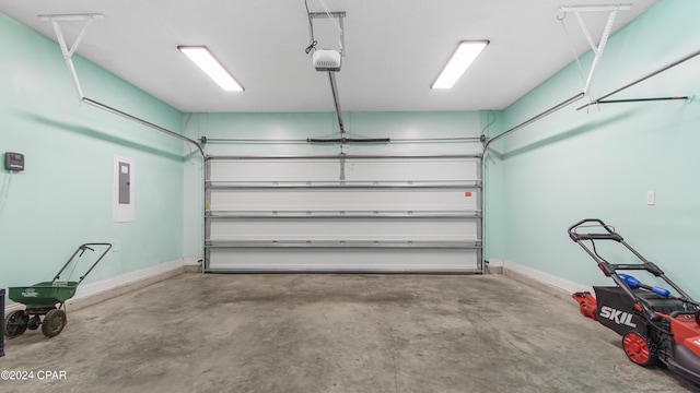 garage with electric panel and a garage door opener