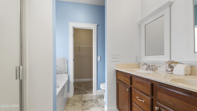 full bathroom featuring separate shower and tub, vanity, and toilet