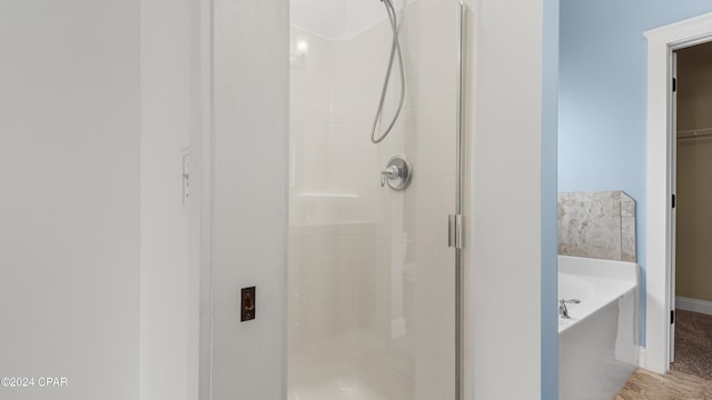 bathroom with independent shower and bath