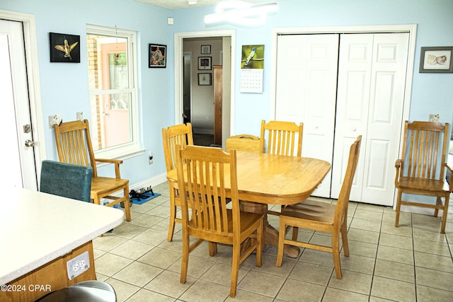 view of tiled dining space