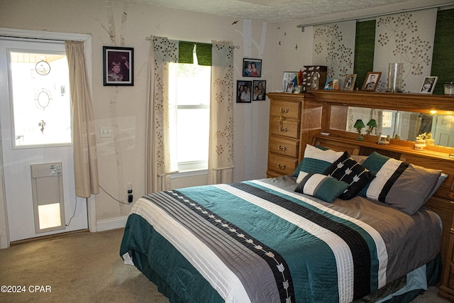 bedroom featuring light carpet