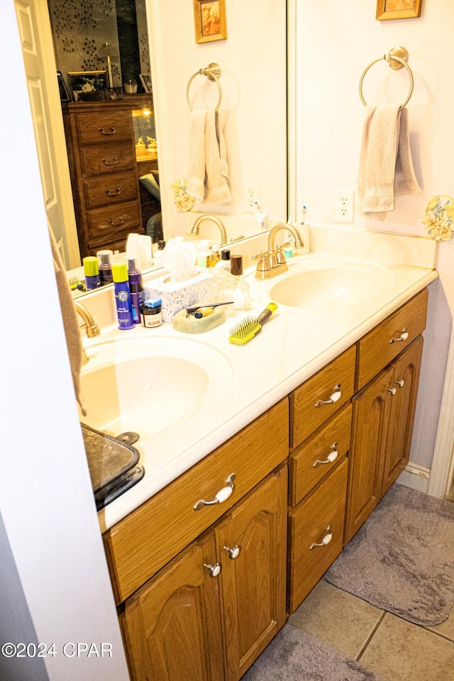 bathroom featuring tile patterned floors and vanity