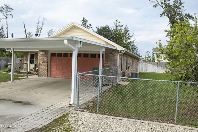 view of front of house with a front yard and a garage