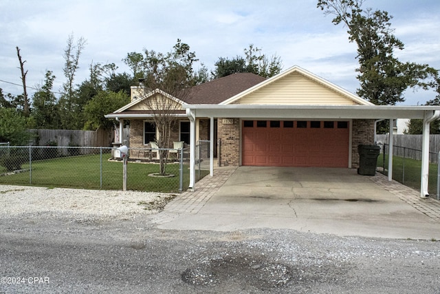 view of front facade with a garage and a front lawn