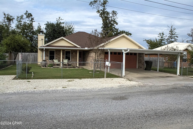 view of front of property with a front yard, a porch, and a carport