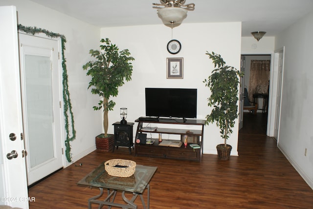 living room featuring dark hardwood / wood-style floors