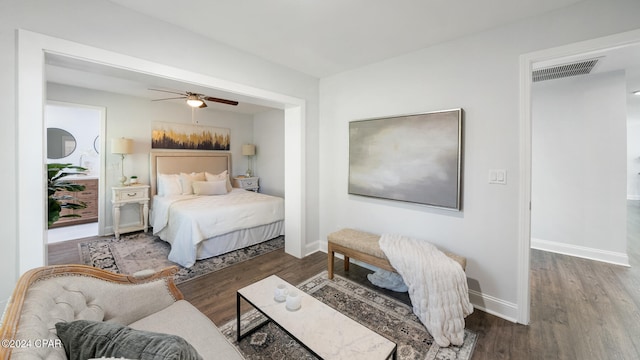 bedroom featuring ceiling fan and dark wood-type flooring