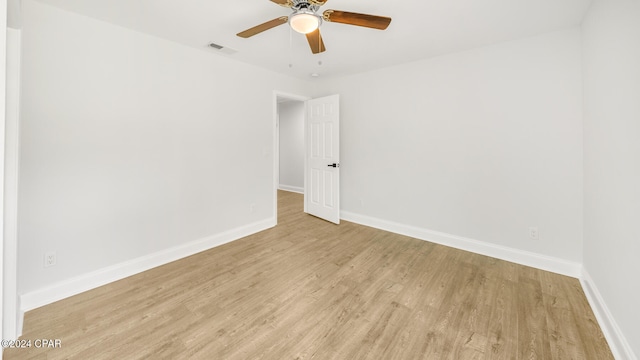 unfurnished room with light hardwood / wood-style floors and ceiling fan