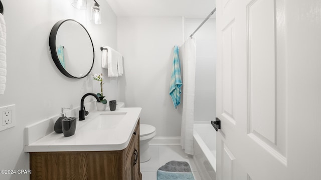 full bathroom featuring tile patterned floors, vanity, shower / bath combination with curtain, and toilet