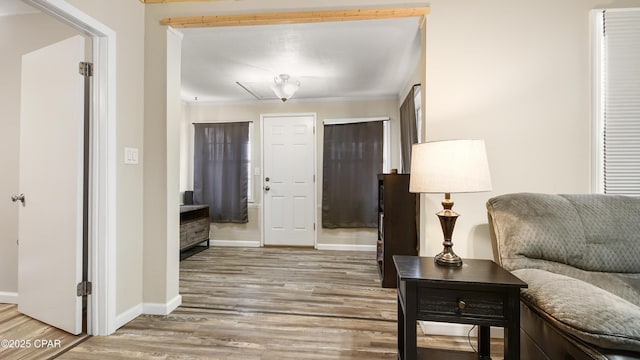 sitting room with hardwood / wood-style flooring