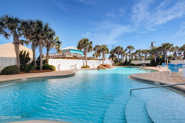 view of pool featuring a patio