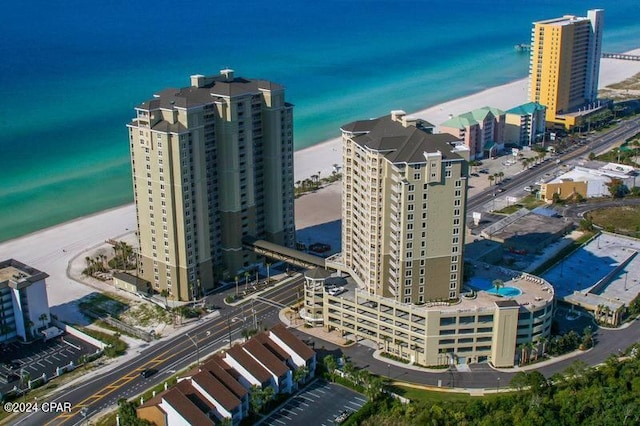 aerial view featuring a water view and a view of the beach