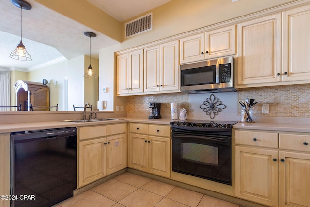 kitchen featuring sink, light tile patterned floors, hanging light fixtures, backsplash, and black appliances