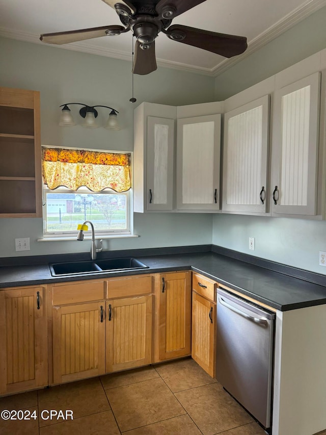 kitchen featuring ceiling fan, dishwasher, sink, crown molding, and light tile patterned floors