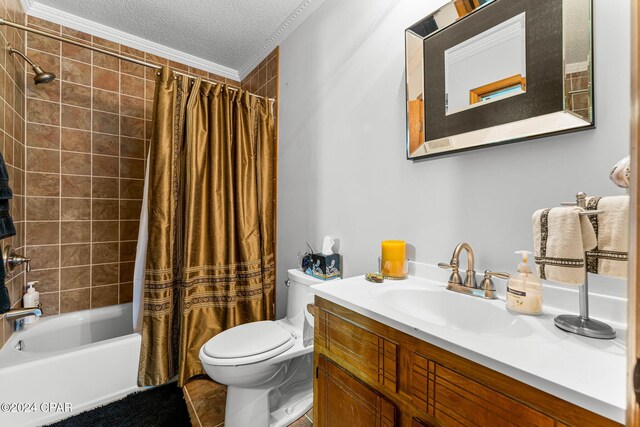 full bathroom with vanity, crown molding, shower / bath combo with shower curtain, and a textured ceiling