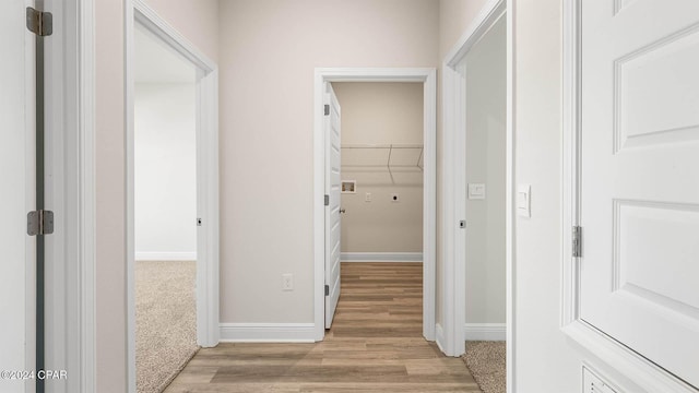 corridor featuring light wood-type flooring