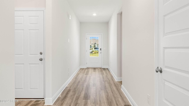 hall featuring light hardwood / wood-style flooring