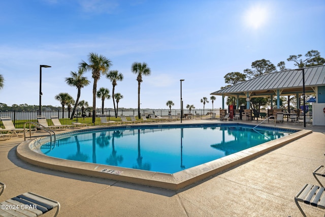 view of swimming pool with a gazebo and a patio