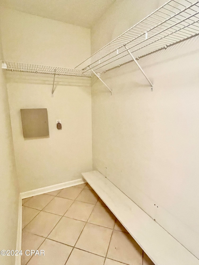 spacious closet featuring tile patterned floors