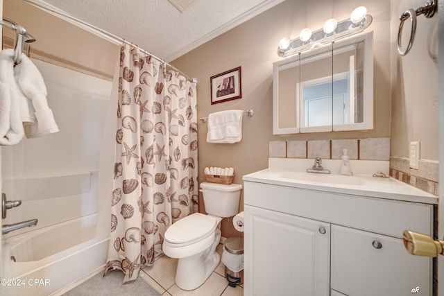 bathroom with toilet, shower / bath combo with shower curtain, a textured ceiling, vanity, and tile patterned floors