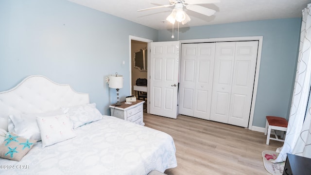 bedroom featuring a closet, ceiling fan, and light hardwood / wood-style flooring