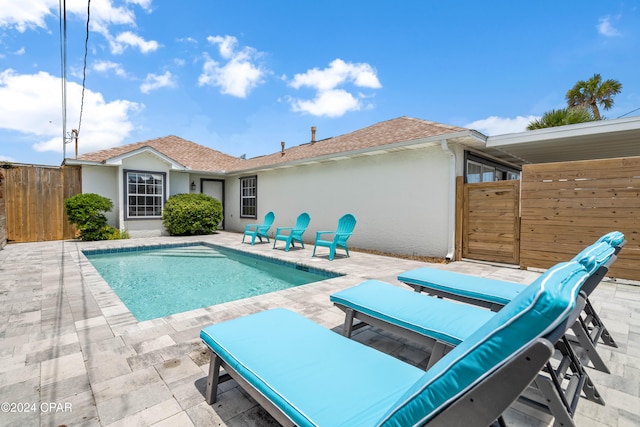 view of pool featuring a patio area