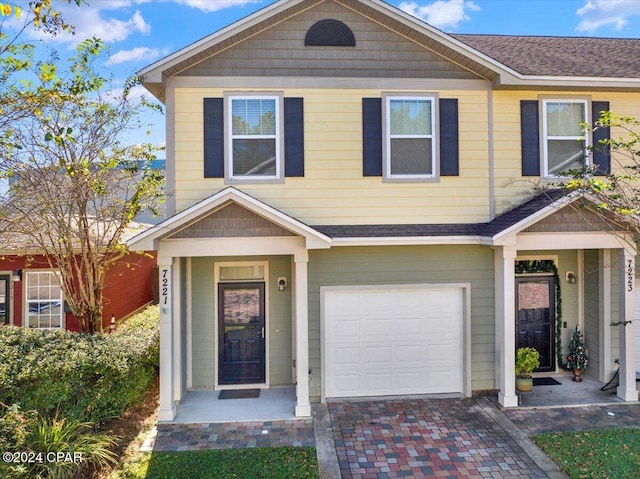 view of front of property featuring a garage