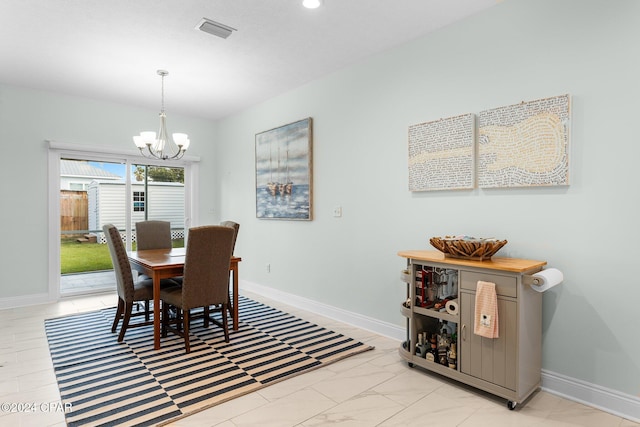 dining room with an inviting chandelier